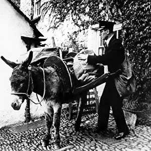 Delivery the post with a donkey, early 1900s