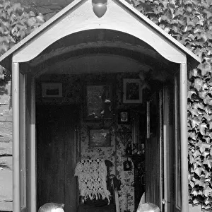 Doorway of Ivy Cottage with Nelstrop and Wilson