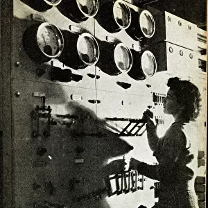 Female BBC engineer checking equipment, WW2