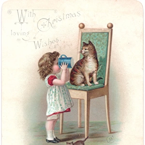 Girl with cat and kitten on a Christmas card
