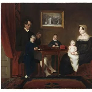 Group portrait of an unidentified family in a domestic inter