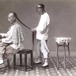 Hair - Chinese man having his onytail plaited, c. 1880 s