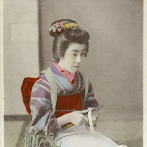 Japan - Geisha girl preparing daikon