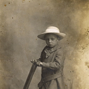Little boy with scooter, c. 1900