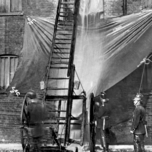 London Salvage Corps at work with salvage sheets