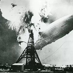 LZ 129 Hindenburg being consumed by fire shortly after a?
