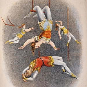 Male and female trapeze performers