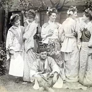 Men and women dressed up in Japanese costume