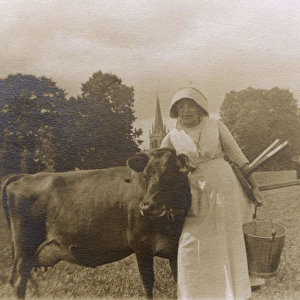 Milkmaid and cow, Madresfield, Worcestershire, WW1
