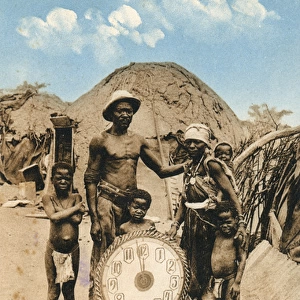 Natives with clock, Swakopmund, south west Africa