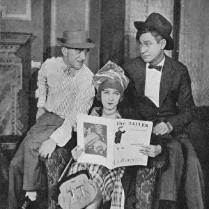 Nelson Keys, Dorothy Gish and Will Rogers on set