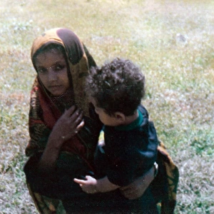Omani girl and a young boy in Oman