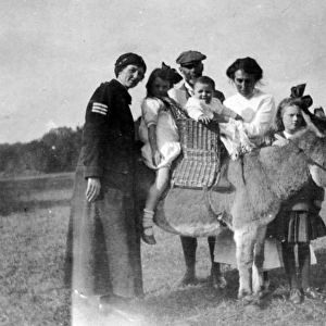 Powell-Cotton family with donkey