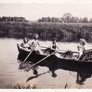 Six in rowing boat