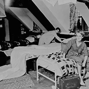 Two schoolboys in a dormitory at Atlantic College (United World College of the Atlantic), St Donat's Castle, Llantwit Major, Glamorgan, South Wales. Date: 1969