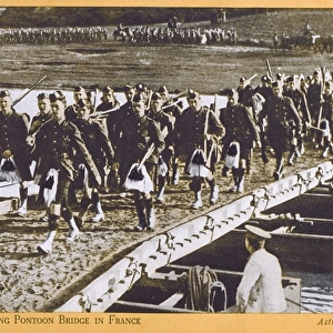 Scottish troops cross a pontoon bridge in France - WWI