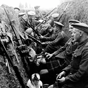 Seaforth Highlanders and a dog in a trench in WW1