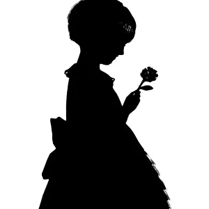 Silhouette of girl with flower