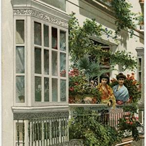 Two Spanish women on a balcony - Cadiz, Southern Spain