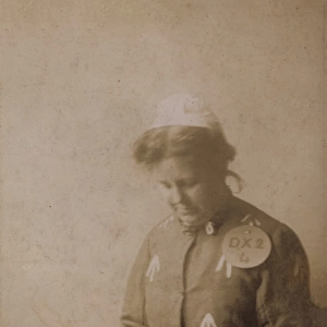 Suffragette in Prison Dress Cleaning Kettle