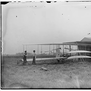 Wilbur and Orville Wright with their second powered machine