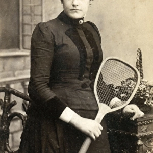 Woman with a tennis racquet, c. 1885