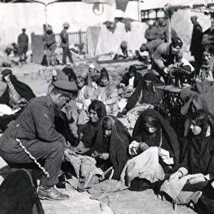 Women refugees sewing army clothing, Baghdad, WW1
