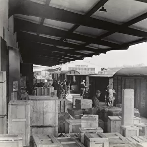 Wooden Crates Unloaded by Airmen from a Train During the?