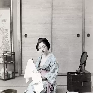 Young woman washing and dressing, Japan, c. 1880 s