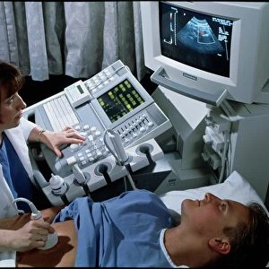 Doppler ultrasound scanning of a mans abdomen