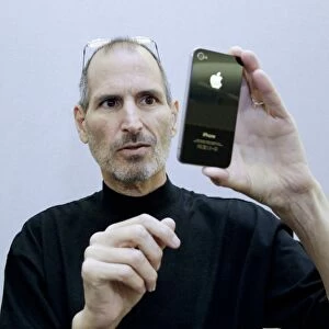 Steve Jobs holding an iPhone 4 C014 / 9432