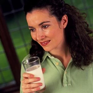 Woman with a glass of milk
