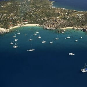 Aerial view over boats moored off the coast of St