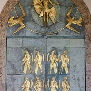 Ascension of Christ and the Theban soldiers by Philippe Kaeppelin on basilica door