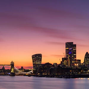 The City of London skyline at sunset including Tower Bridge, the Gherkin and The Walkie Talkie Building, London, England, United Kingdom, Europe