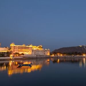 City Palace in Udaipur at night, reflected in Lake Pichola, Udaipur, Rajasthan, India