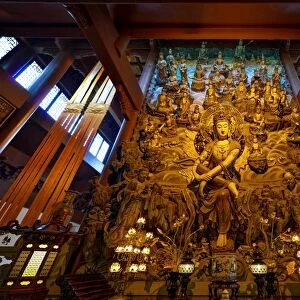 GuanYin Buddha with many smaller Buddhas at Yong Fu Temple, Hangzhou, Zhejiang, China, Asia