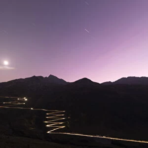 Lights of car traces at dusk, Spluga Pass, Chiavenna Valley, Switzerland, Europe