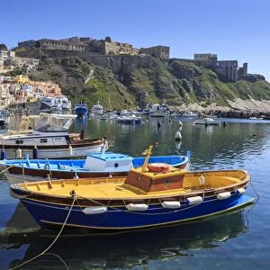 Marina Corricella, pretty fishing village, colourful houses, boats and Terra Murata