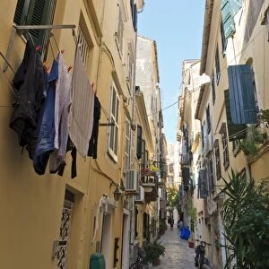Narrow street with washing, Old Town, Corfu Town, UNESCO World Heritage Site, Corfu, Ionian Islands, Greek Islands, Greece, Europe