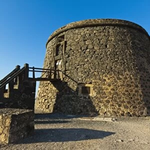 Old tower (toston), a defence against English pirates at this northwest coast village, El Cotillo, Fuerteventura, Canary Islands, Spain, Europe