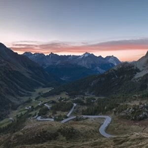 Panoramic of the road bends of Bernina Pass at dawn, Poschiavo Valley, Engadine