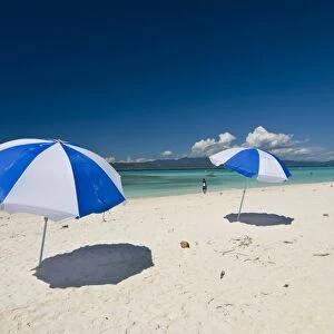 Parasols at the beautiful beach in Nosy Iranja, a little island near Nosy Be