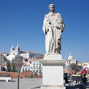 San Vincente de Fora statue and view of Alfama district