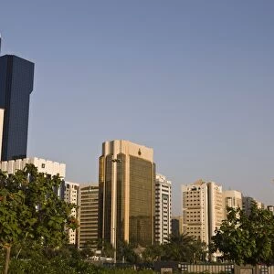 Skyline of modern buildings on the Corniche (waterfront) at Abu Dhabi, United Arab Emirates