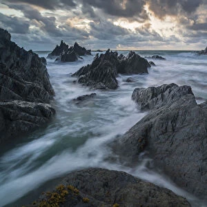 Stormy sunset over the dramatic North Devon coast, Devon, England, United Kingdom, Europe