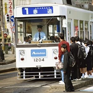 Students boarding a bus in Nagasaki