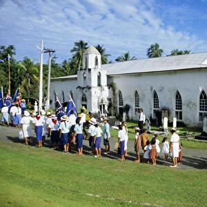 Sunday procession arriving at church for service, Aitutaki, Cook Islands