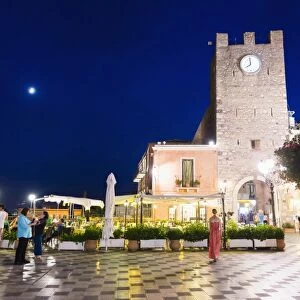 Taormina at night, the clock tower in Piazza IX Aprile on Corso Umberto, the main street in Taormina, Sicily, Italy, Europe