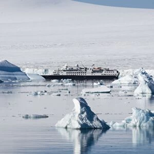 Tour ship in ice near Brown Bluff, Antarctic Peninsula, Antarctica, Polar Regions